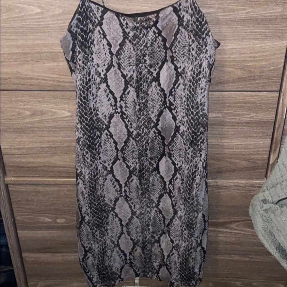 Cute mini dress. Snake print! Only worn once!